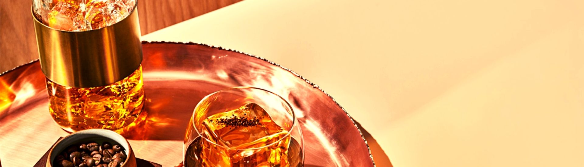 basil hayden bourbon and ice on glass