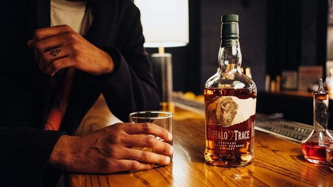 buffalo trace bourbon bottle and glass