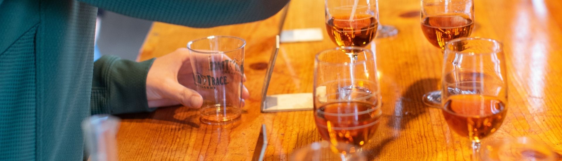 filling glasses with buffalo trace bourbon