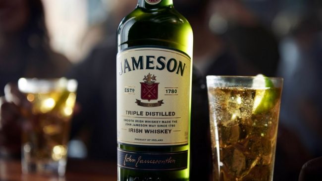 jameson irish whiskey bottle and glasses