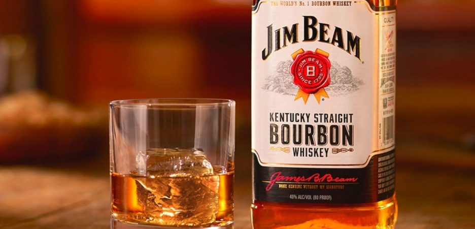 jim beam bourbon glass and bottle