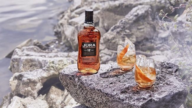 jura elixir single malt scotch whisky bottle and glasses