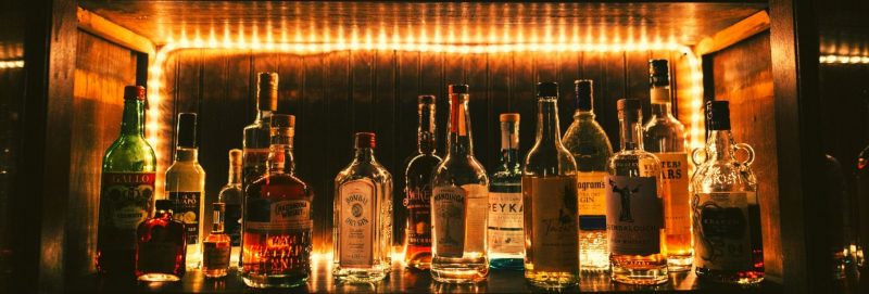 many different whiskey bottles