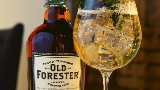 old forester bourbon with glass and ice
