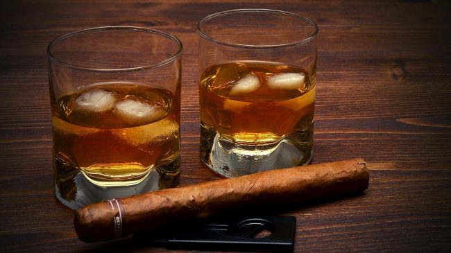 peated whiskey glasses with cigar