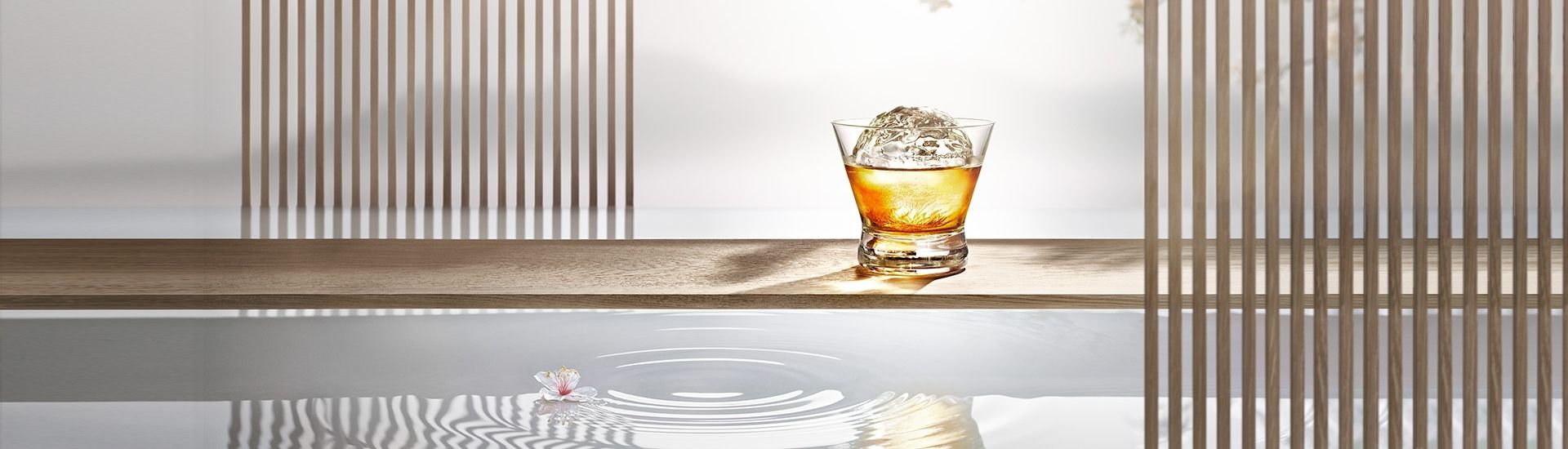 suntory toki whiskey and ice on glass